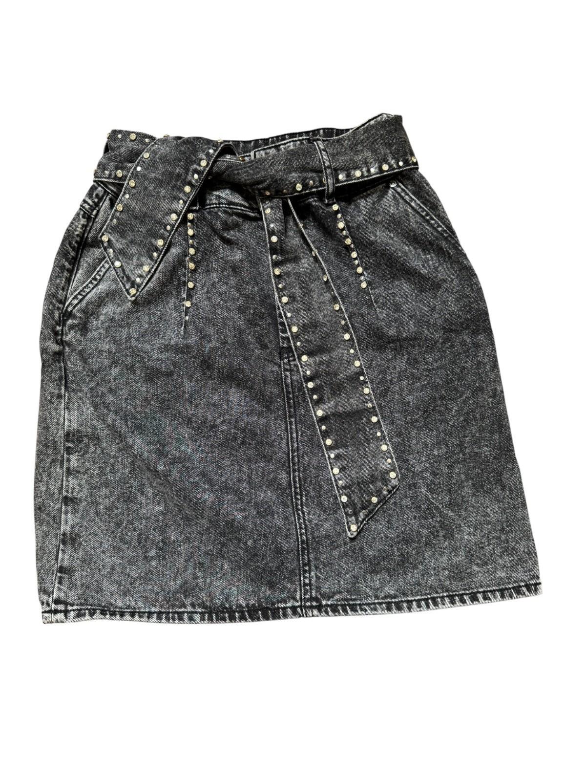 Black denim skirt with studded details on a white background