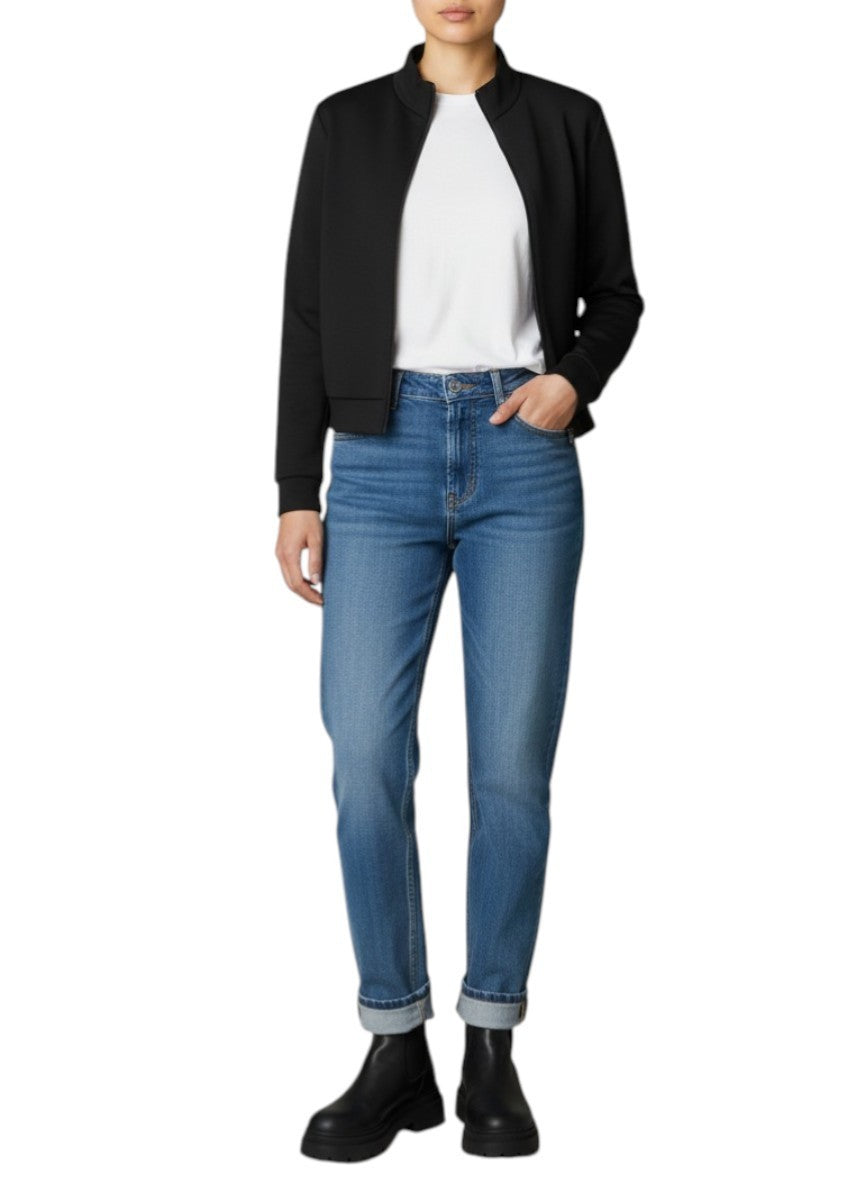 Naked Pear model wearing a black T by Alexander Wang neoprene bomber jacket with a mock collar and zipper closure.
