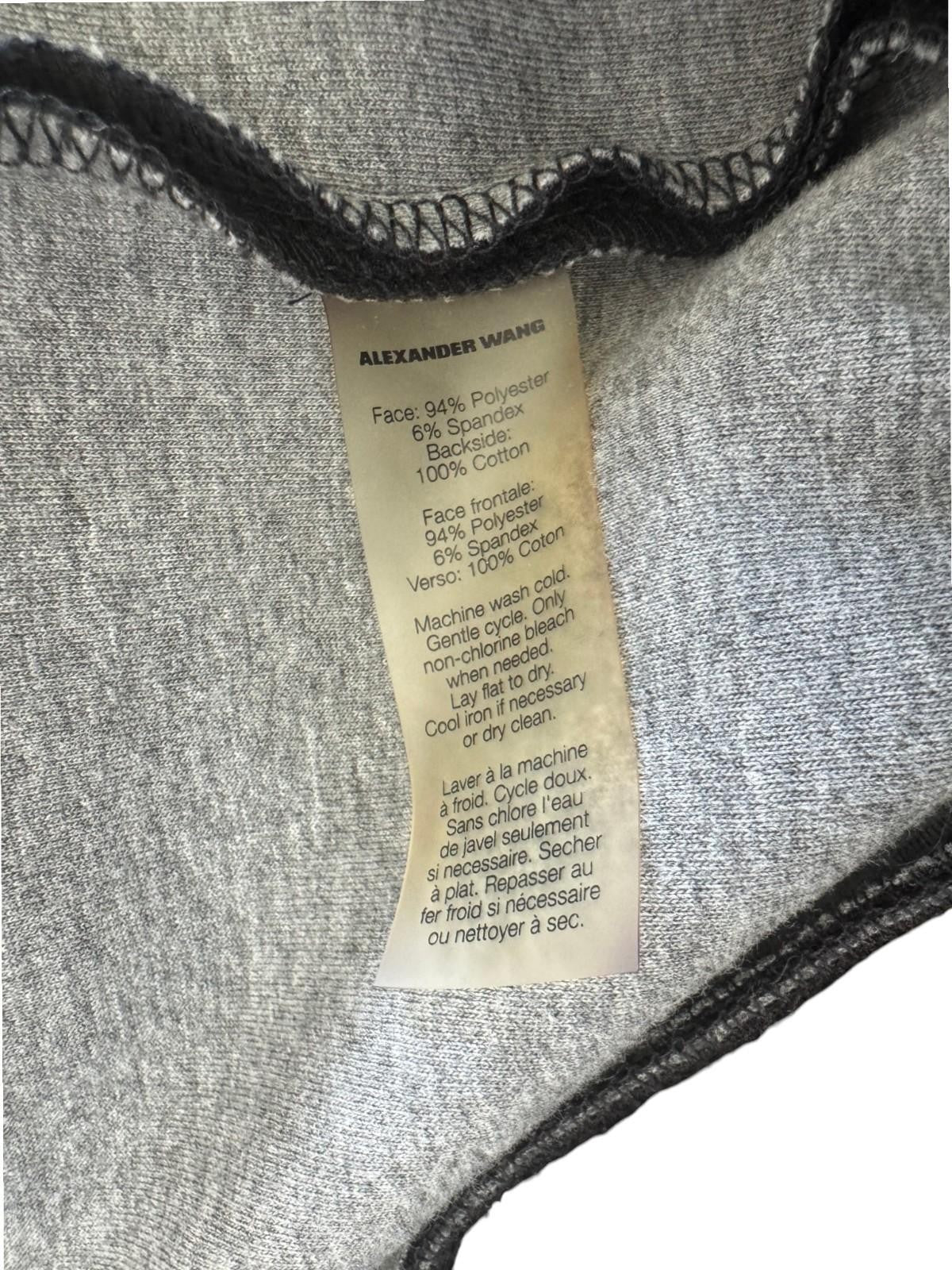 Naked Pear T by Alexander Wang black neoprene bomber jacket care label showing fabric composition and washing instructions