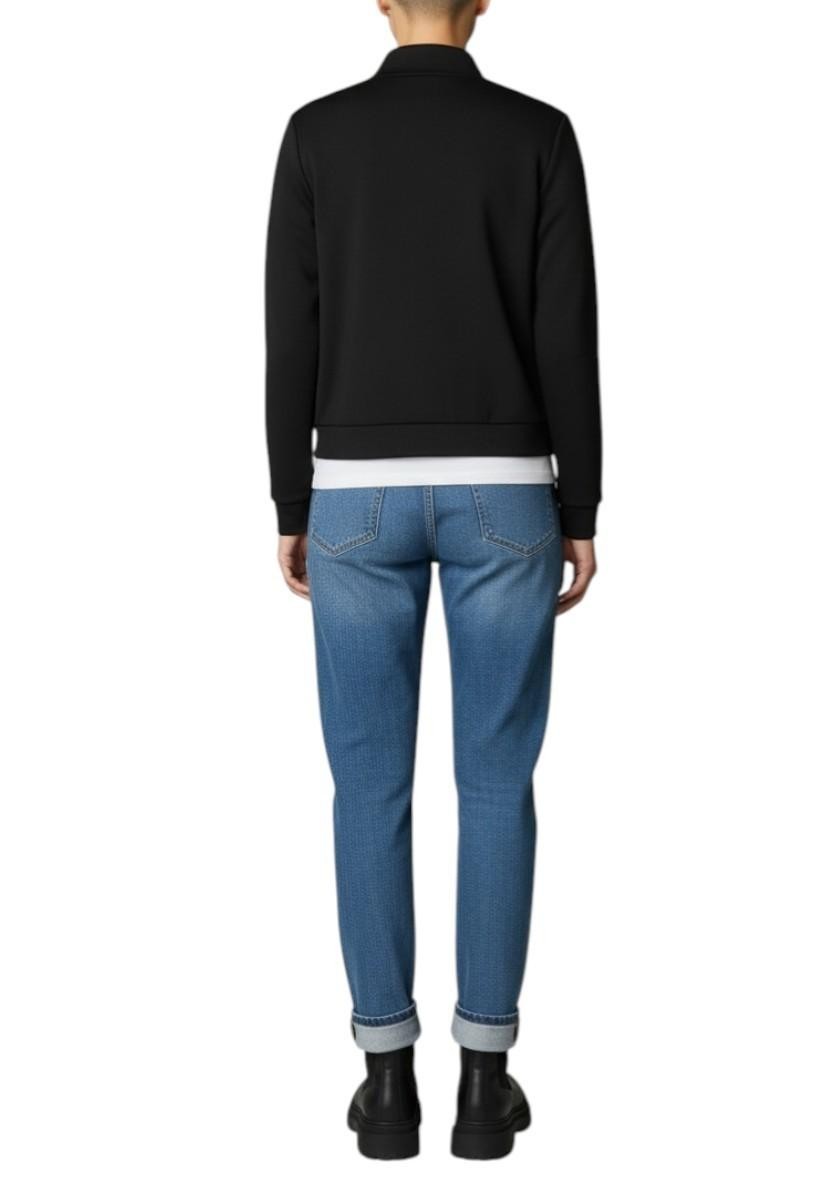 Naked Pear T by Alexander Wang black neoprene bomber jacket worn by a model from the back view with blue jeans
