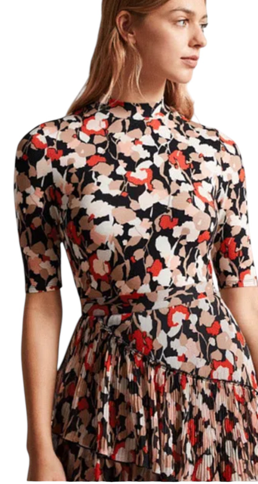 Woman wearing a floral dress with a white background