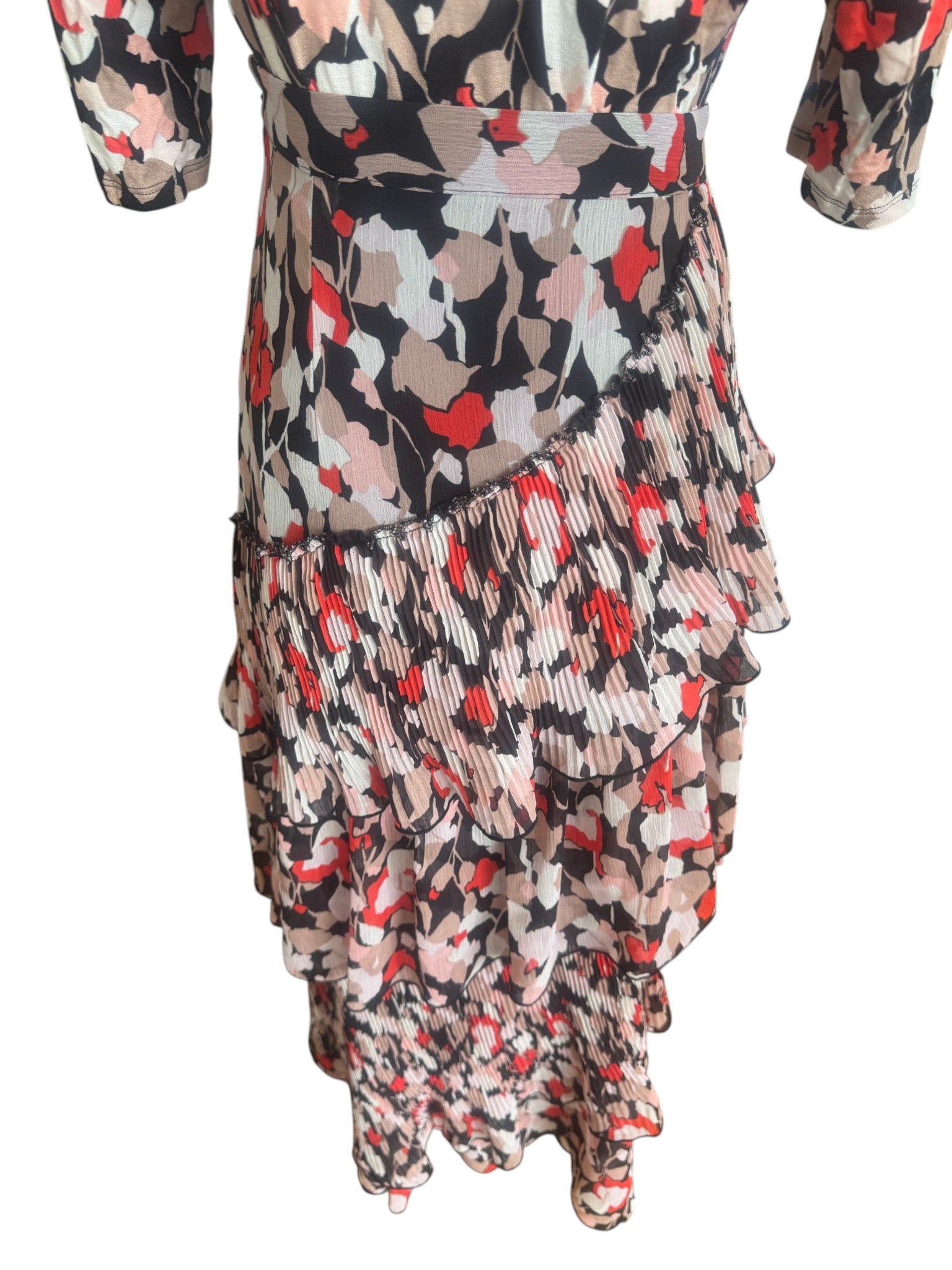 Multicolored floral dress with ruffled layers on a white background