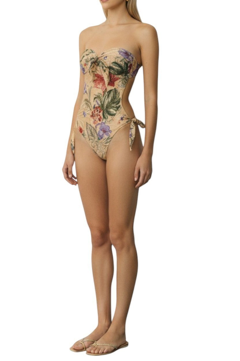 AI generated image of Naked Pear Zimmermann Coco floral one-piece swimsuit in tan with bow details, open back, and high-cut leg design.