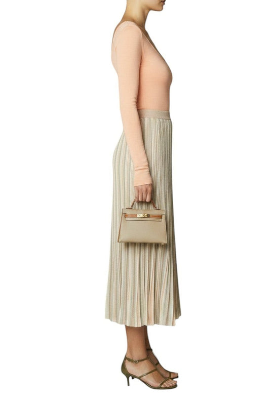 Naked Pear Zimmermann Illuminate Moulin pleated midi skirt in pastel multi-stripe knit fabric worn by a model