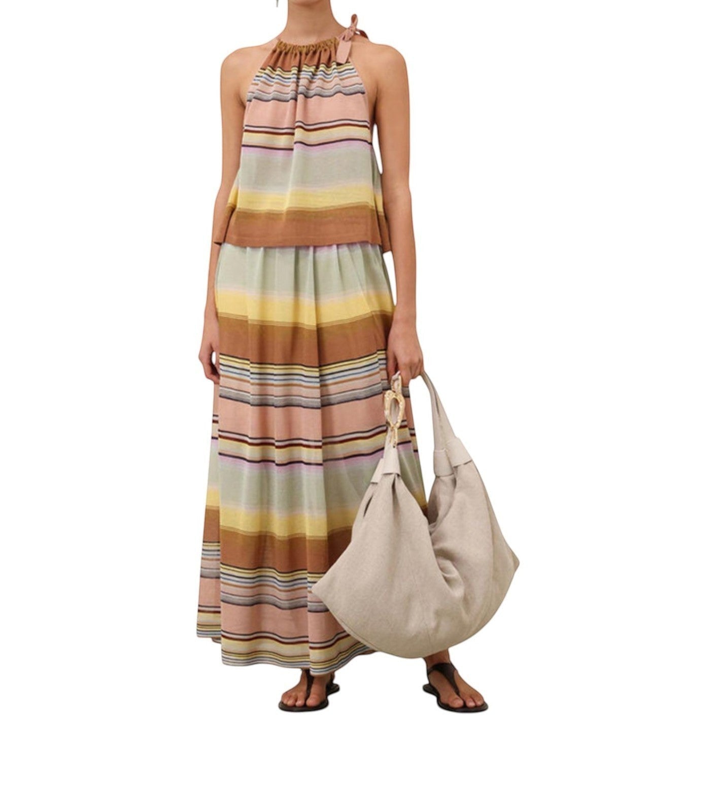 Naked Pear Zimmermann multi-stripe knit halterneck top and matching maxi skirt set with a large beige tote bag.