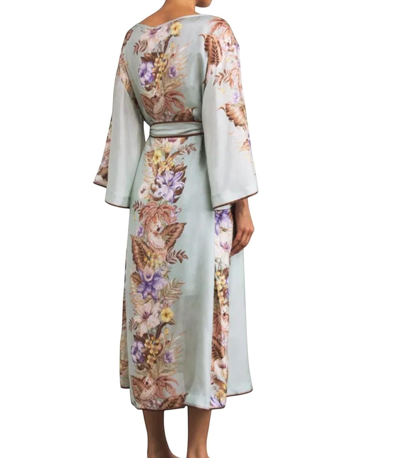 Back view of Naked Pear Zimmermann silk midi tunic dress in sage floral print with wide kimono sleeves and waist belt