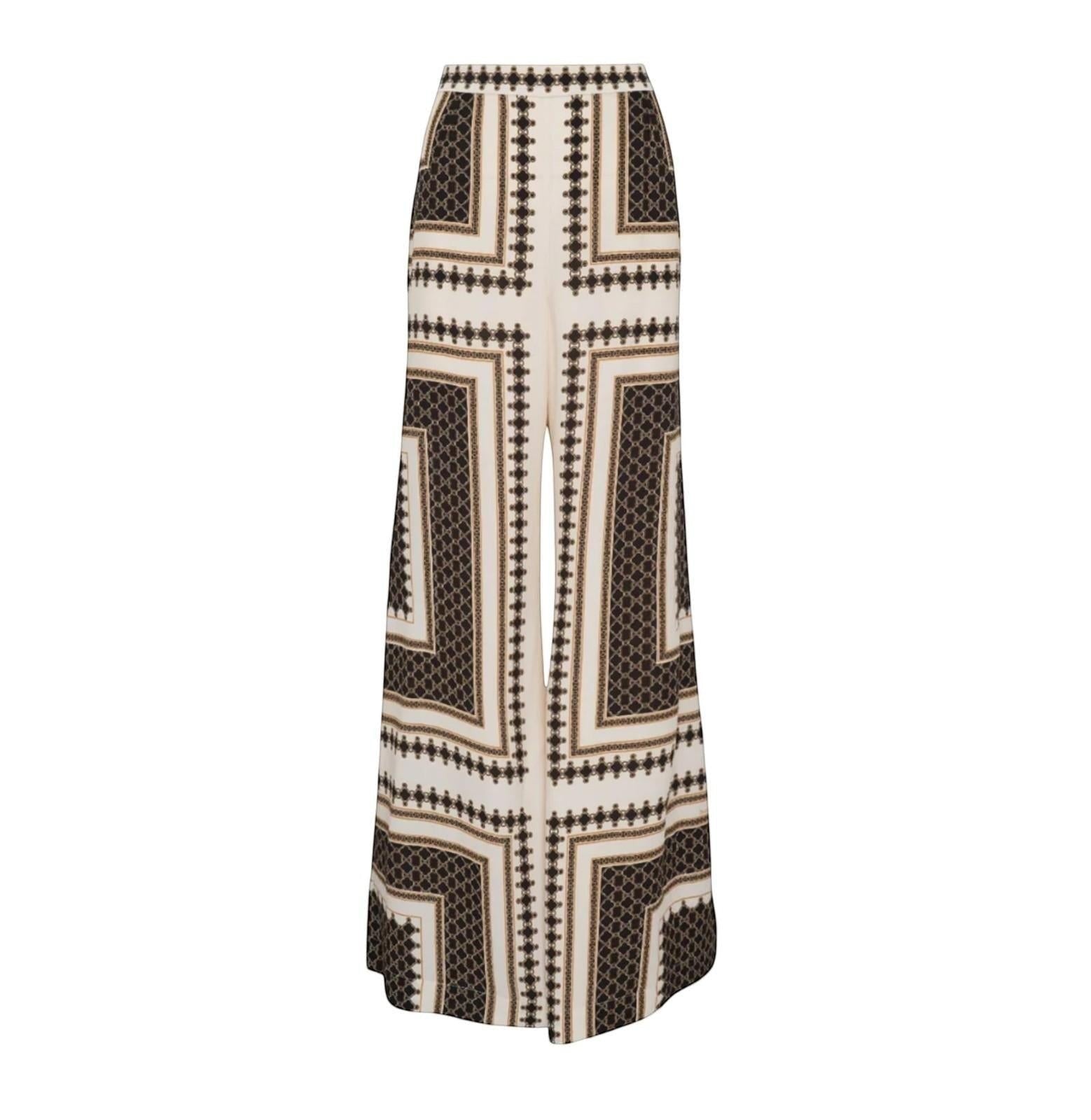 Naked Pear Zimmermann high-waisted flare pants in a black, cream, and brown geometric silk-blend print.