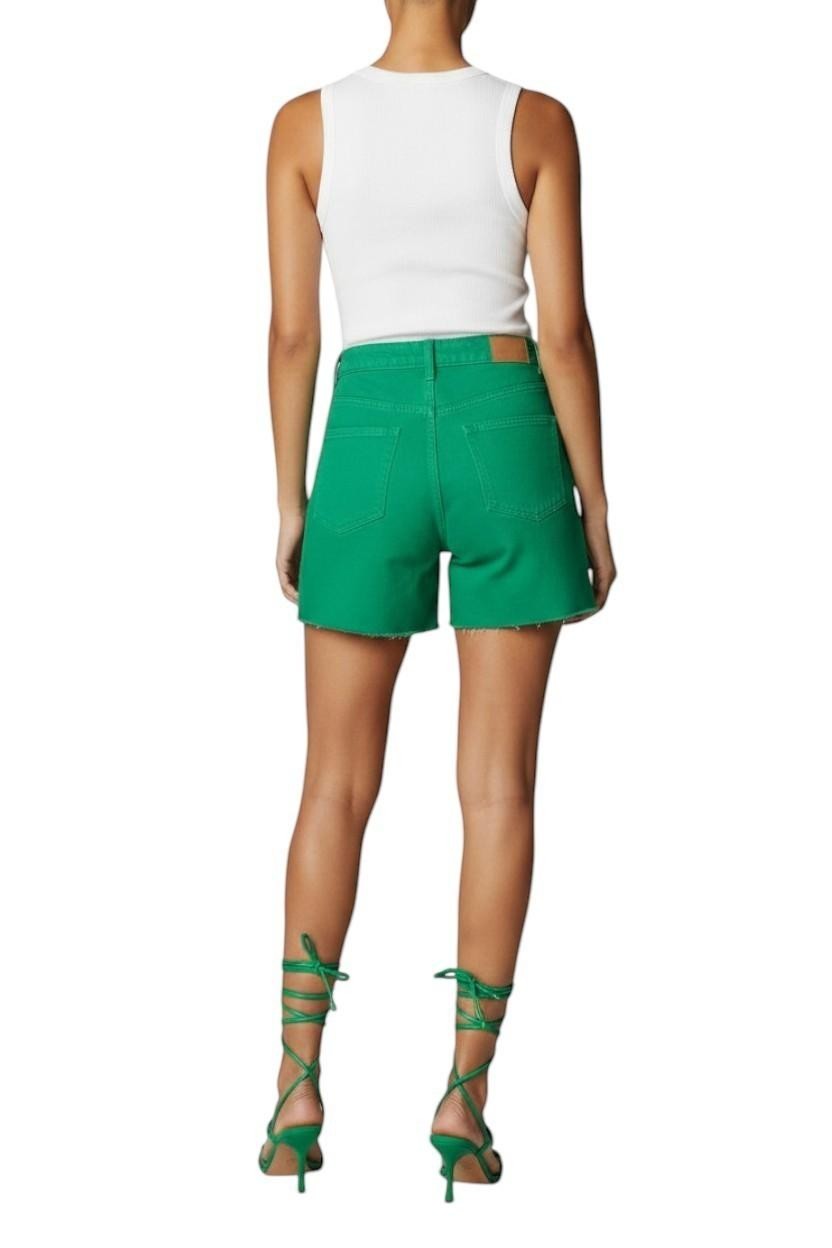 Naked Pear model wearing green denim shorts and Zimmermann Gleam strappy stiletto sandals with pebble details