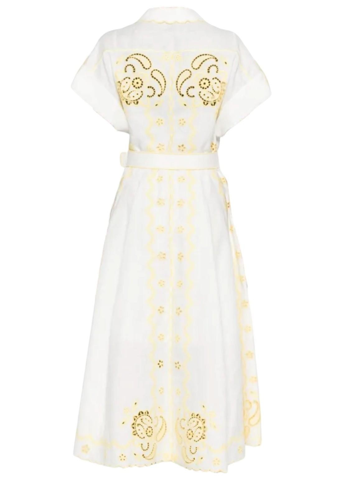 AI generated image of Back view of Naked Pear Zimmermann Lucky linen midi dress in ivory and lemon with yellow floral embroidery and belt.