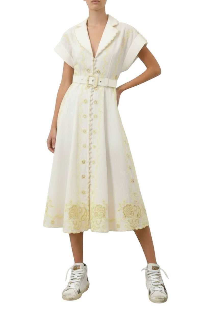 AI generated image of Naked Pear Zimmermann Lucky linen midi dress in ivory and lemon with embroidered details, collar, and buckled waist belt.