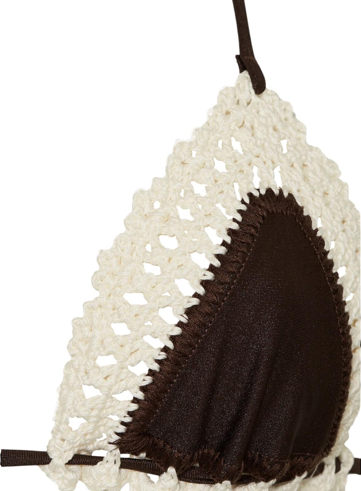 Brown bikini bottom with white crochet top on a white background