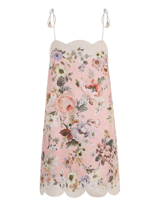 Floral dress with scalloped hem on a white background