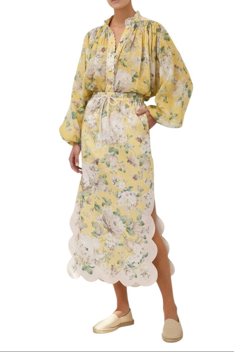 AI generated image of Woman wearing a yellow floral dress on a white background