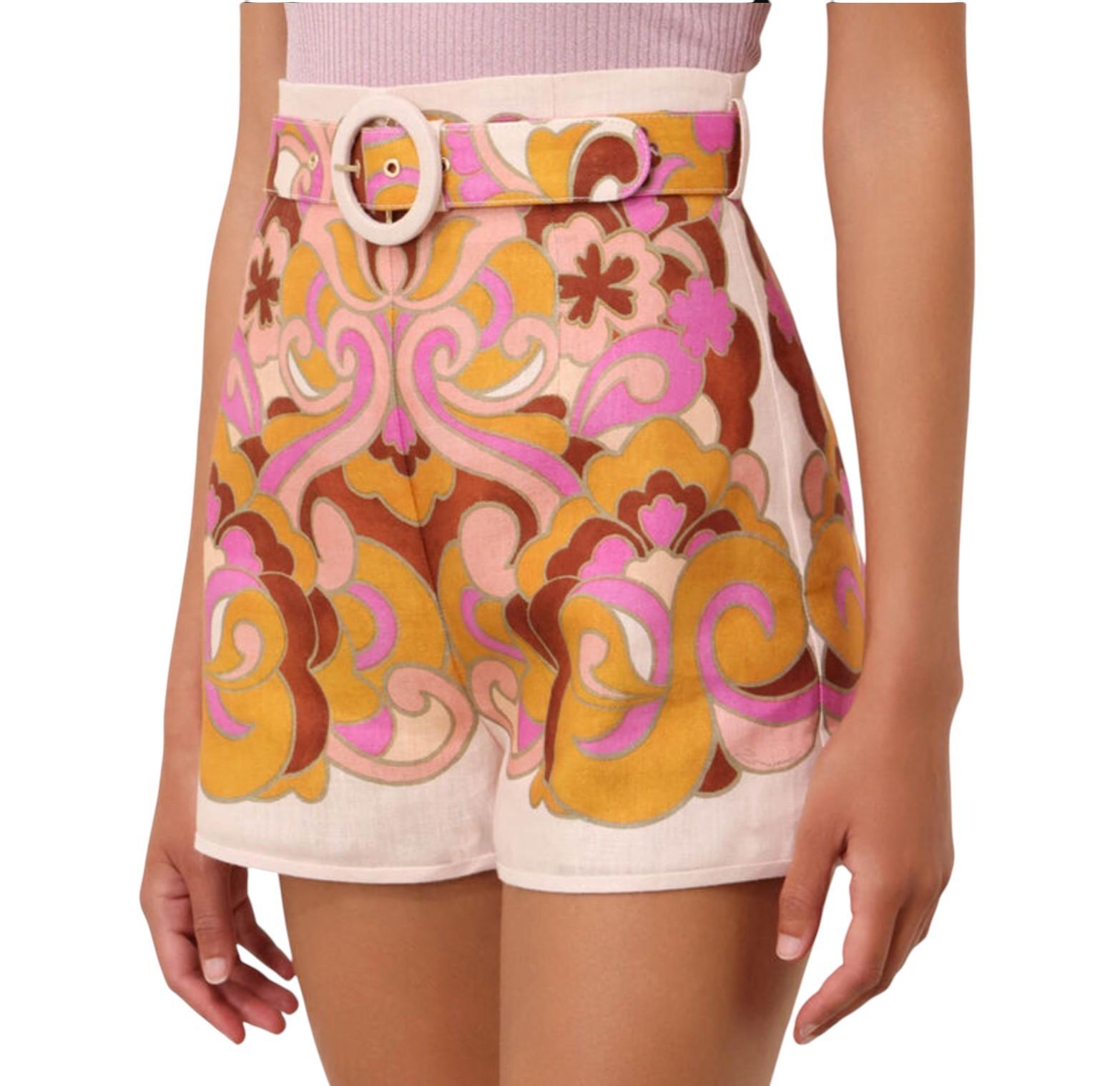 Shorts with a colorful floral pattern on a white background