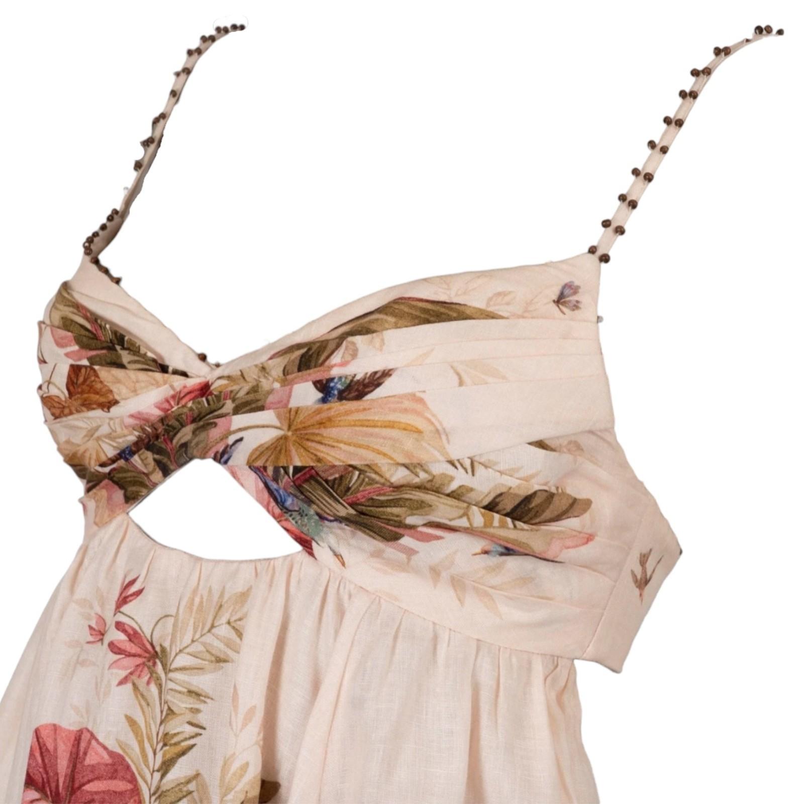 Floral dress with beaded straps on a white background
