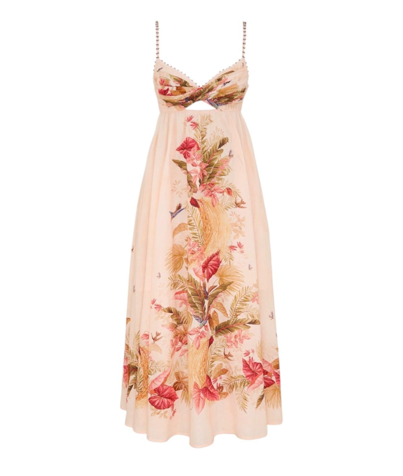 Floral dress with a sheer overlay on a white background