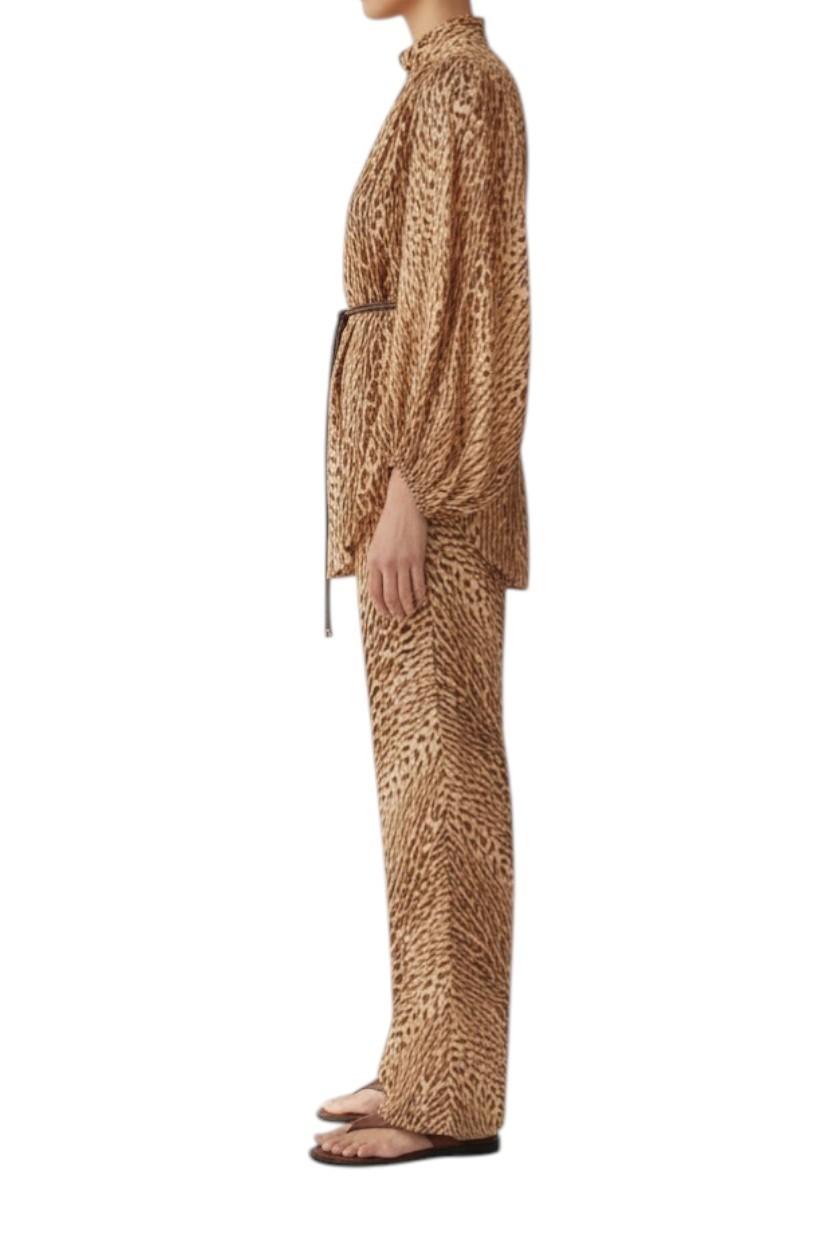 AI generated image of Person wearing a leopard print outfit on a white background