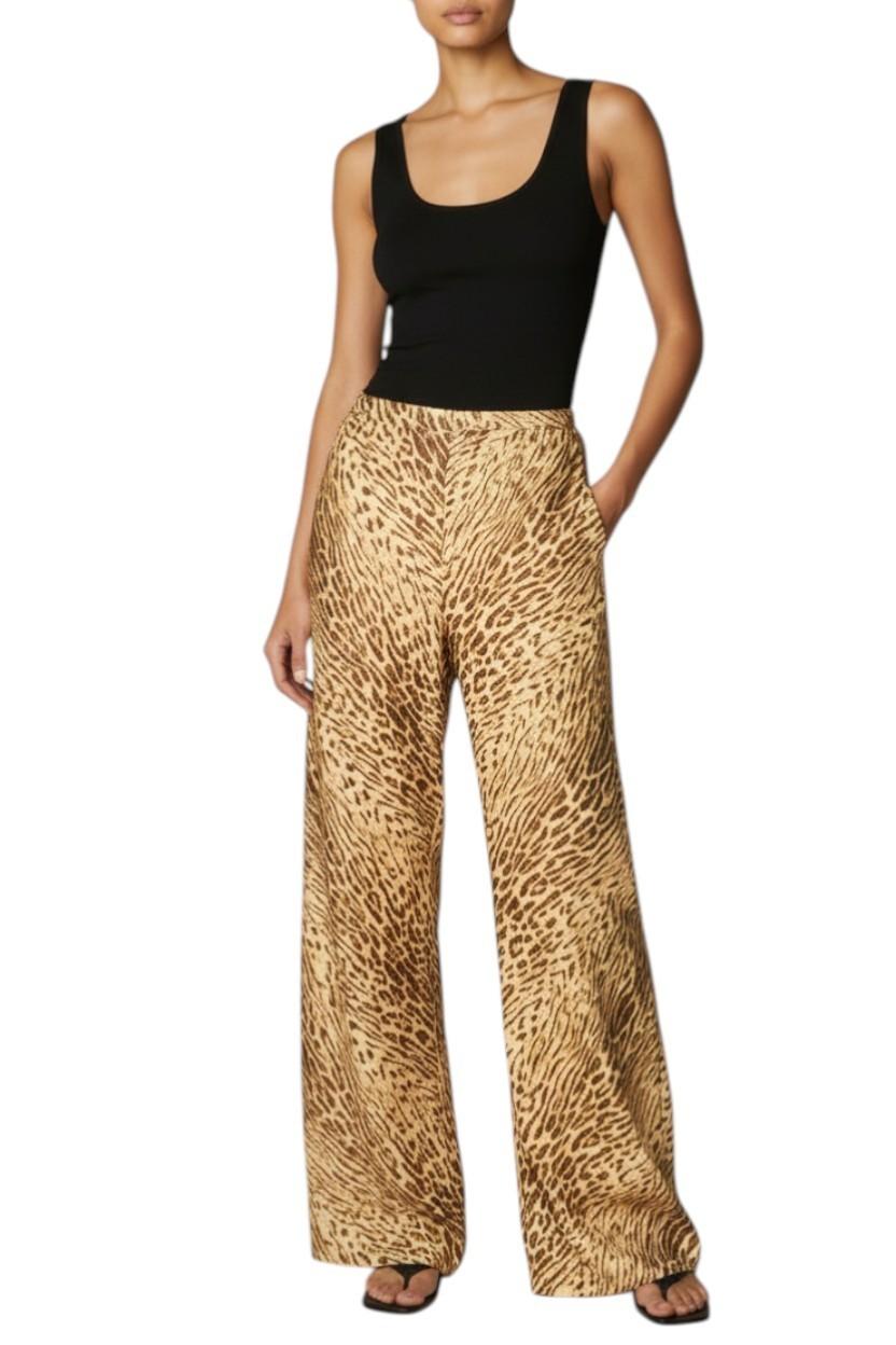 AI generated image of Woman wearing a black tank top and leopard print pants on a white background