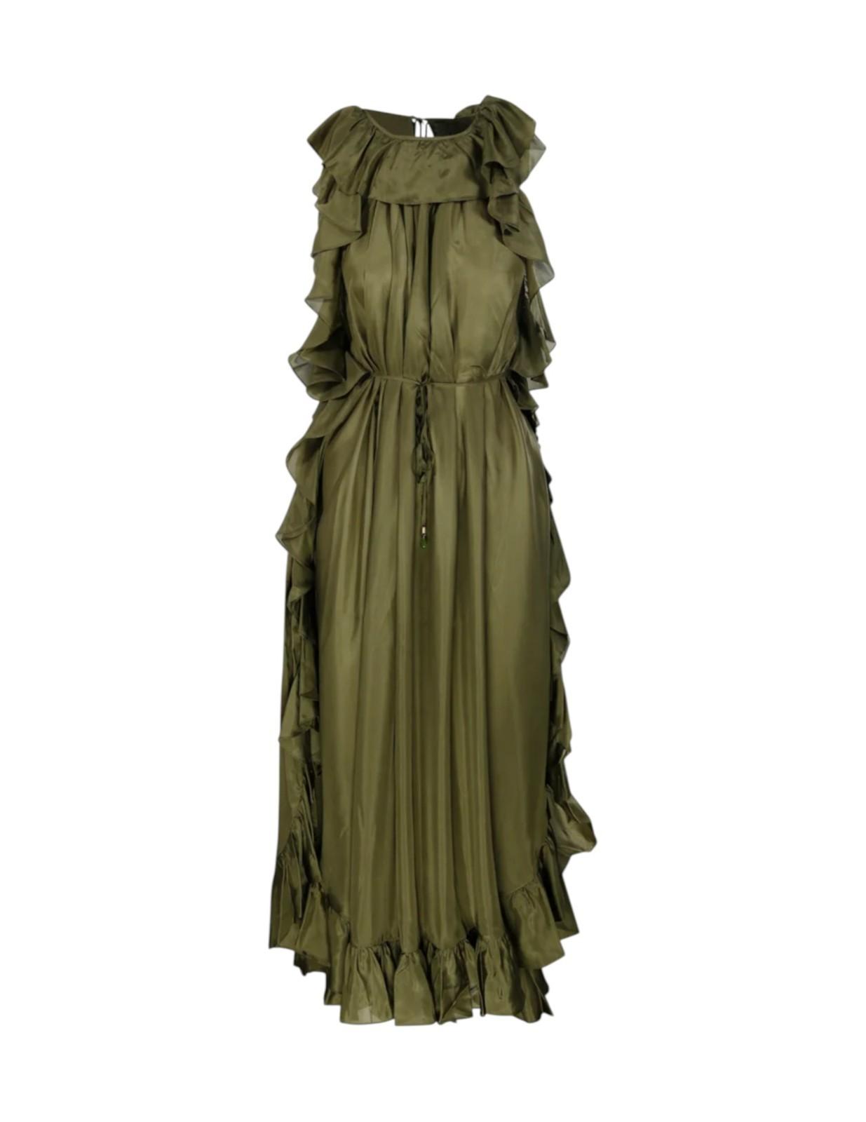 Green dress with ruffled details on a white background