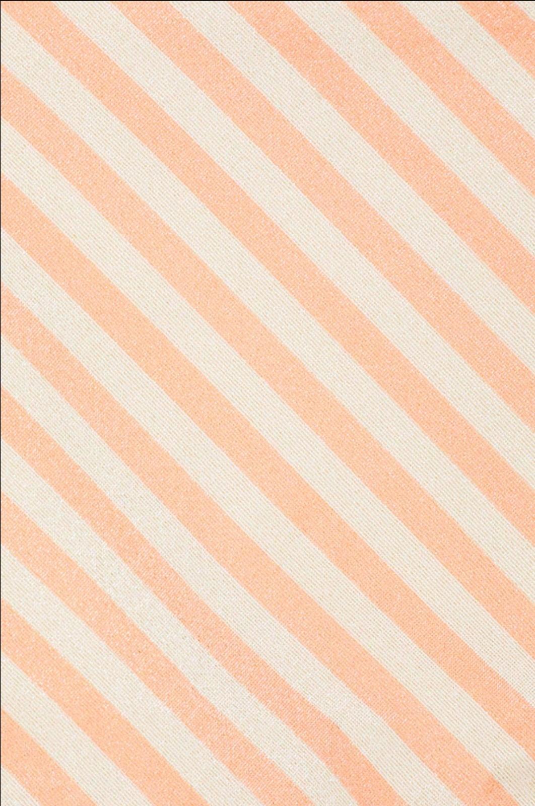 Pattern of pink and white diagonal stripes on a striped fabric background
