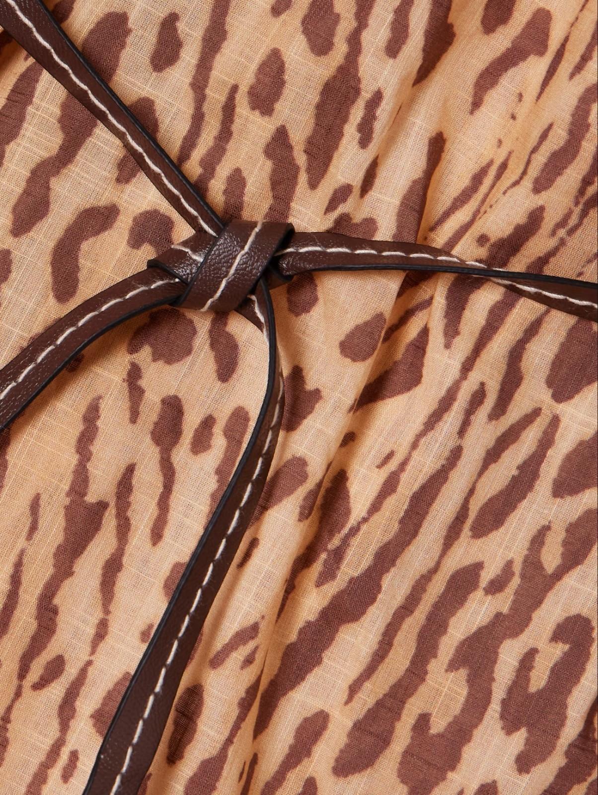 Close-up of leopard print fabric with a knot