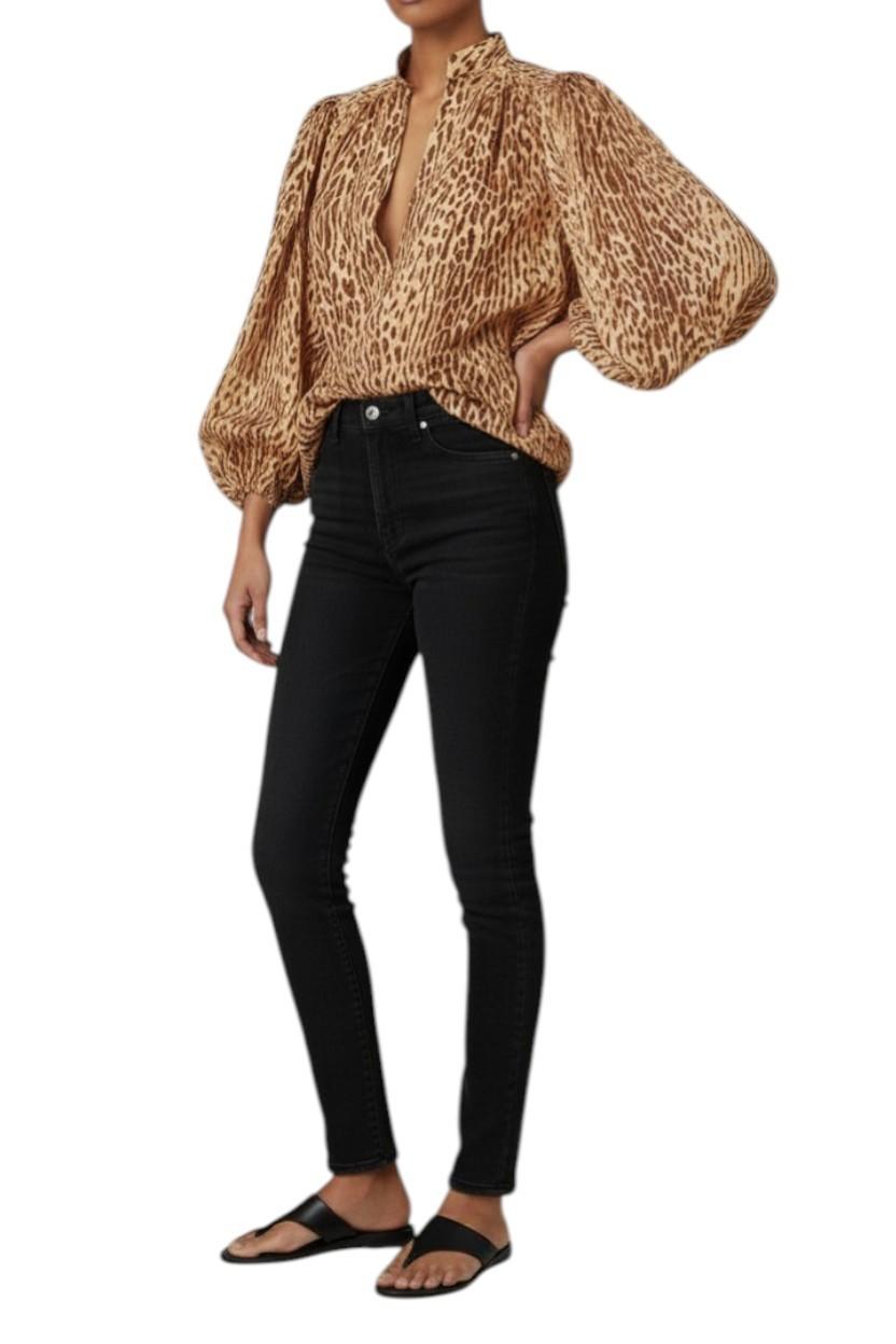 AI generated image of Person wearing a leopard print blouse and black jeans on a white background