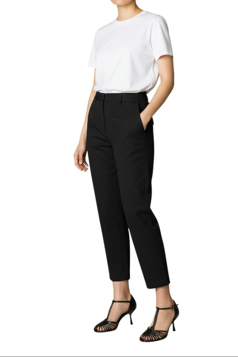 AI-generated image of Person wearing a white top and black pants with black shoes on a white background