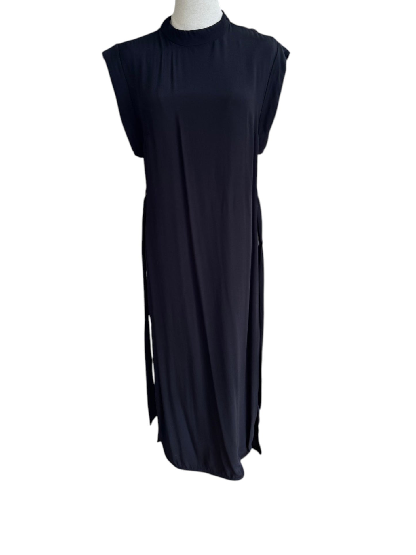 Black sleeveless dress on a mannequin against a white background