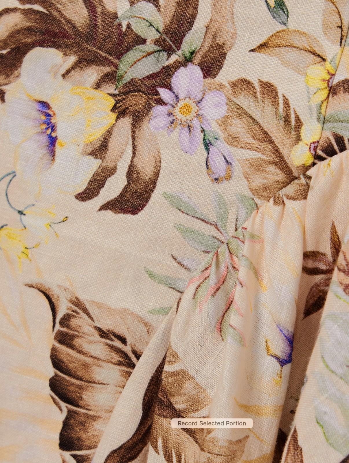 Close-up of floral and leaf pattern on fabric