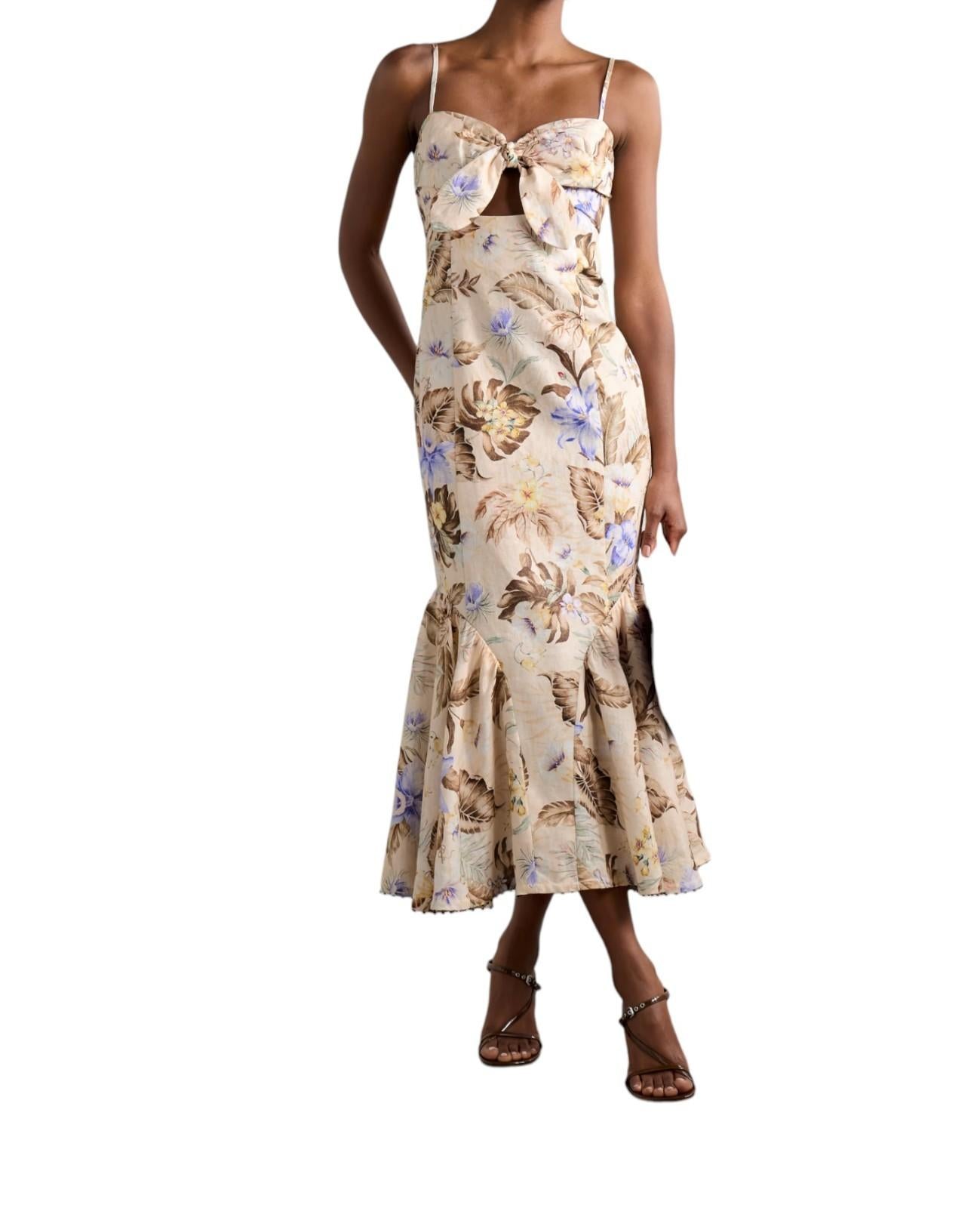 Woman wearing a floral dress on a white background