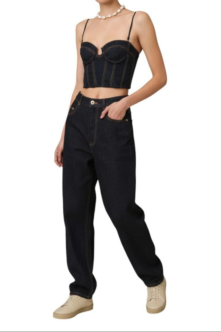 AI generated image of Person wearing a black denim corset top and high-waisted jeans on a white background