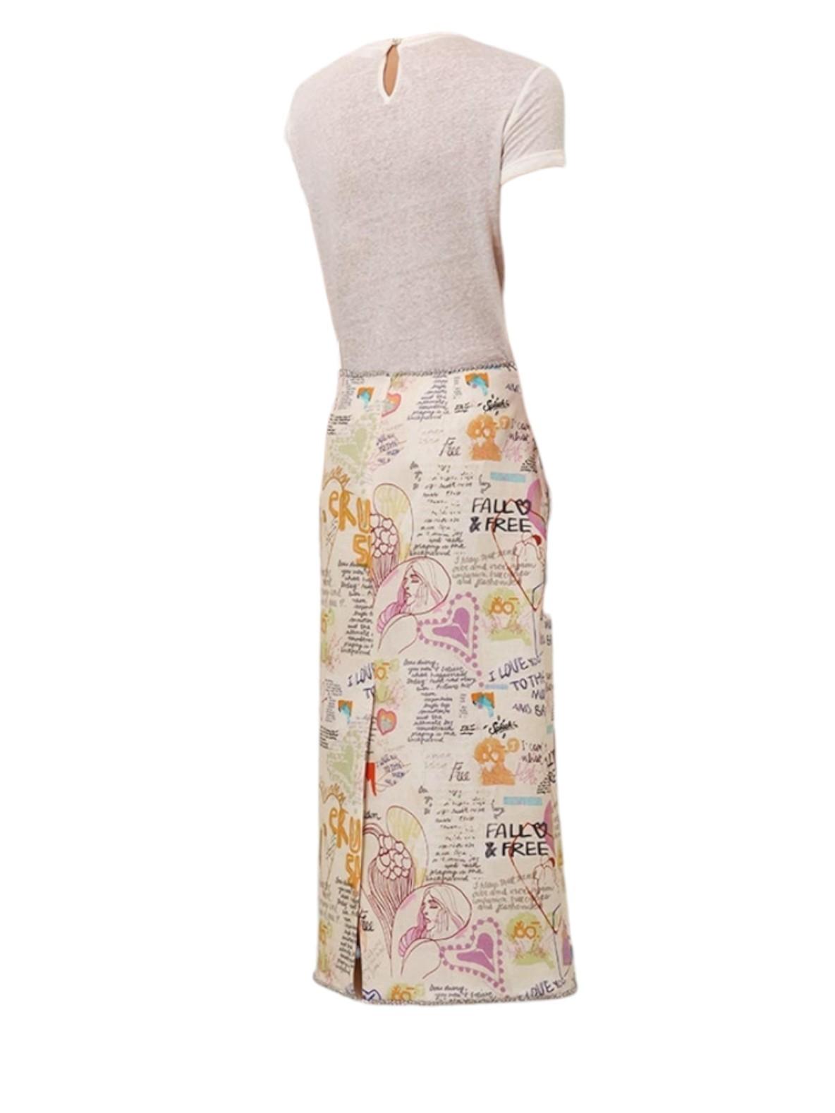Beige dress with a colorful patterned skirt on a white background