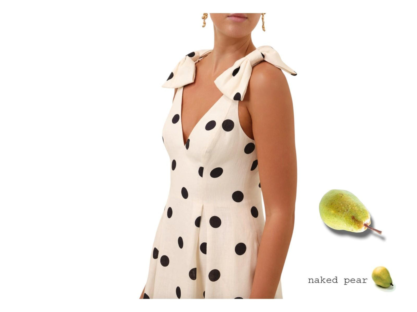 Woman wearing a polka dot dress with a pear graphic and 'naked pear' text on a white background