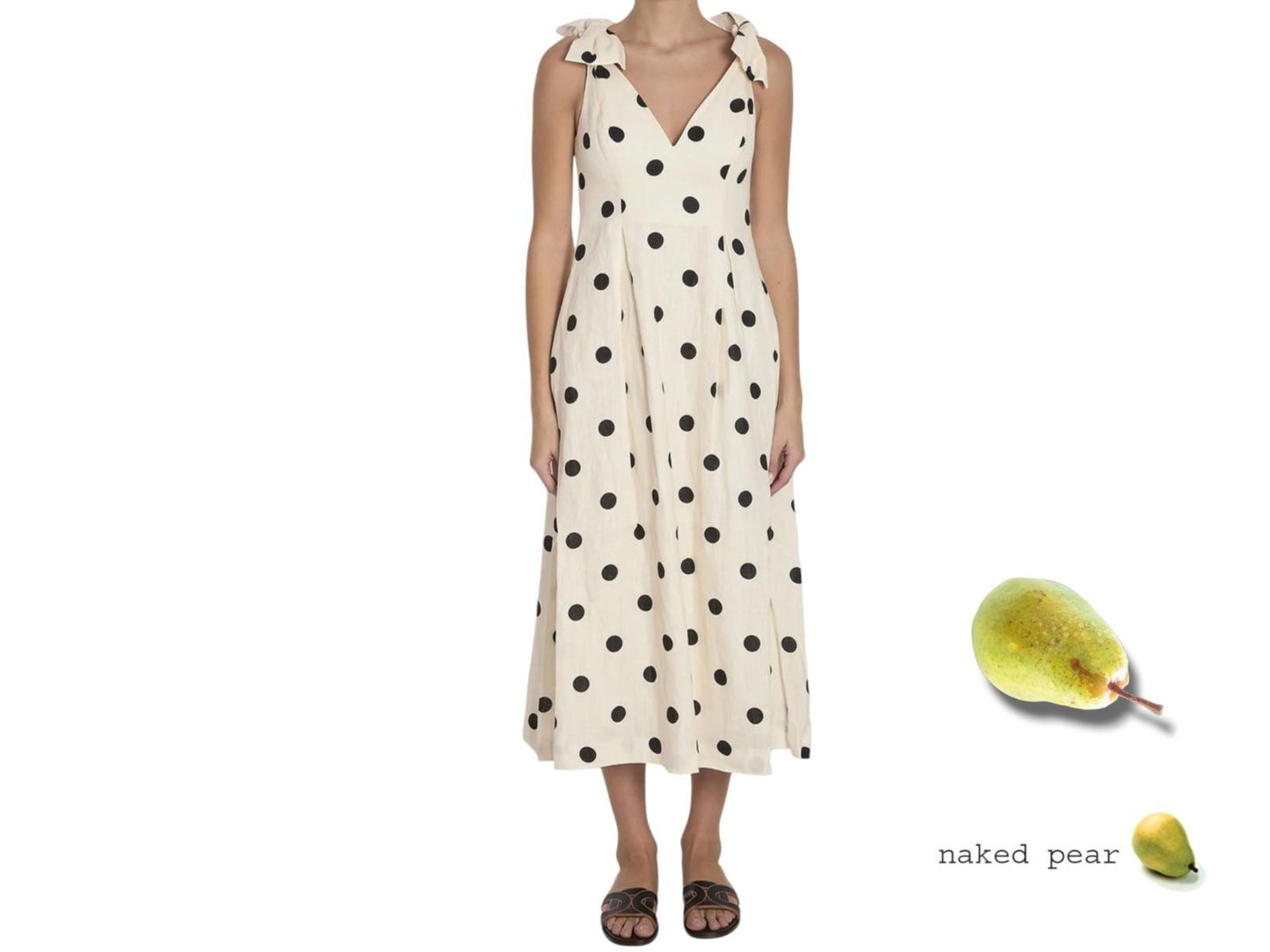 Woman wearing a polka dot dress with a naked pear graphic on a white background
