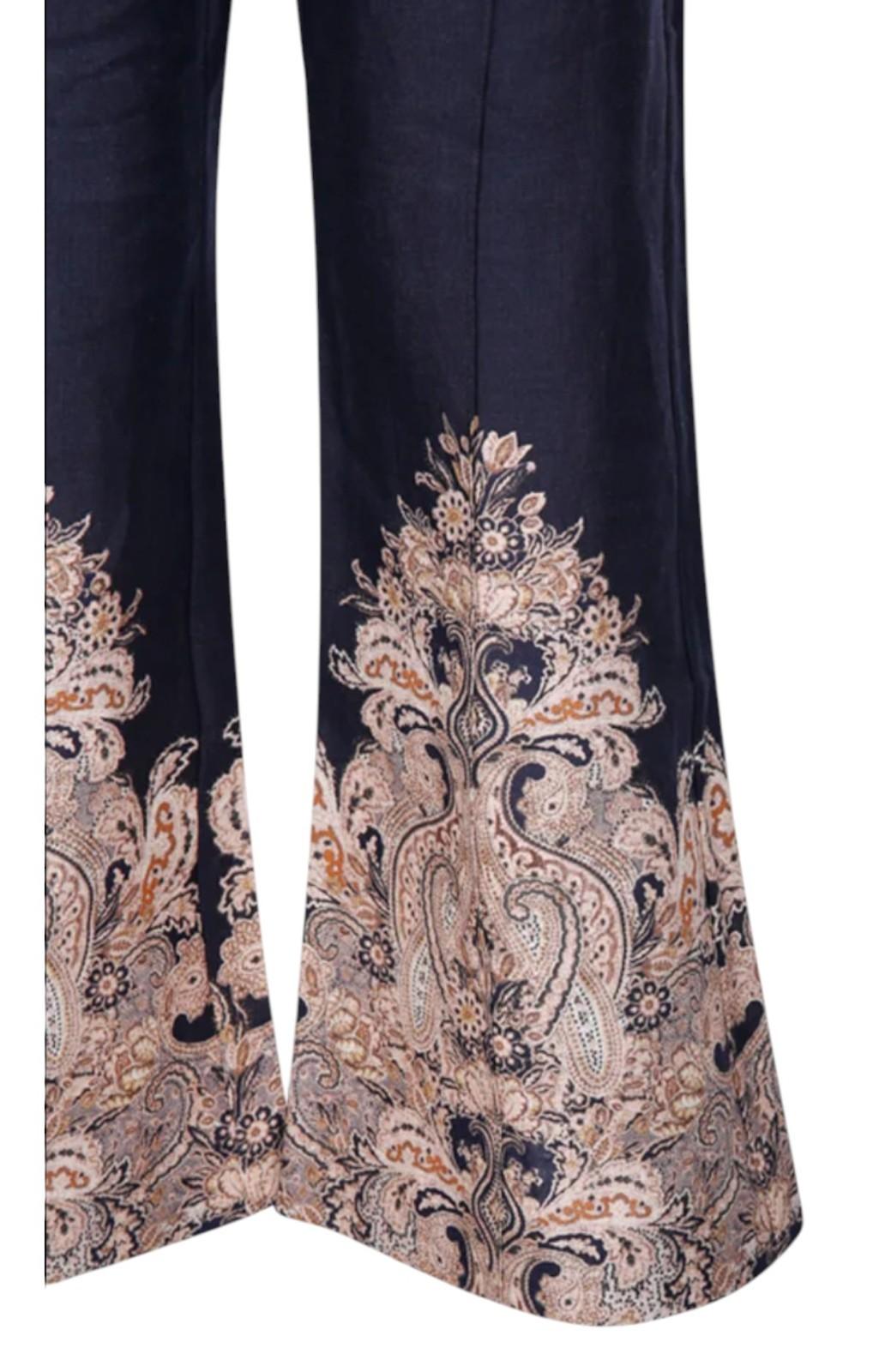 Navy pants with intricate paisley pattern on a white background