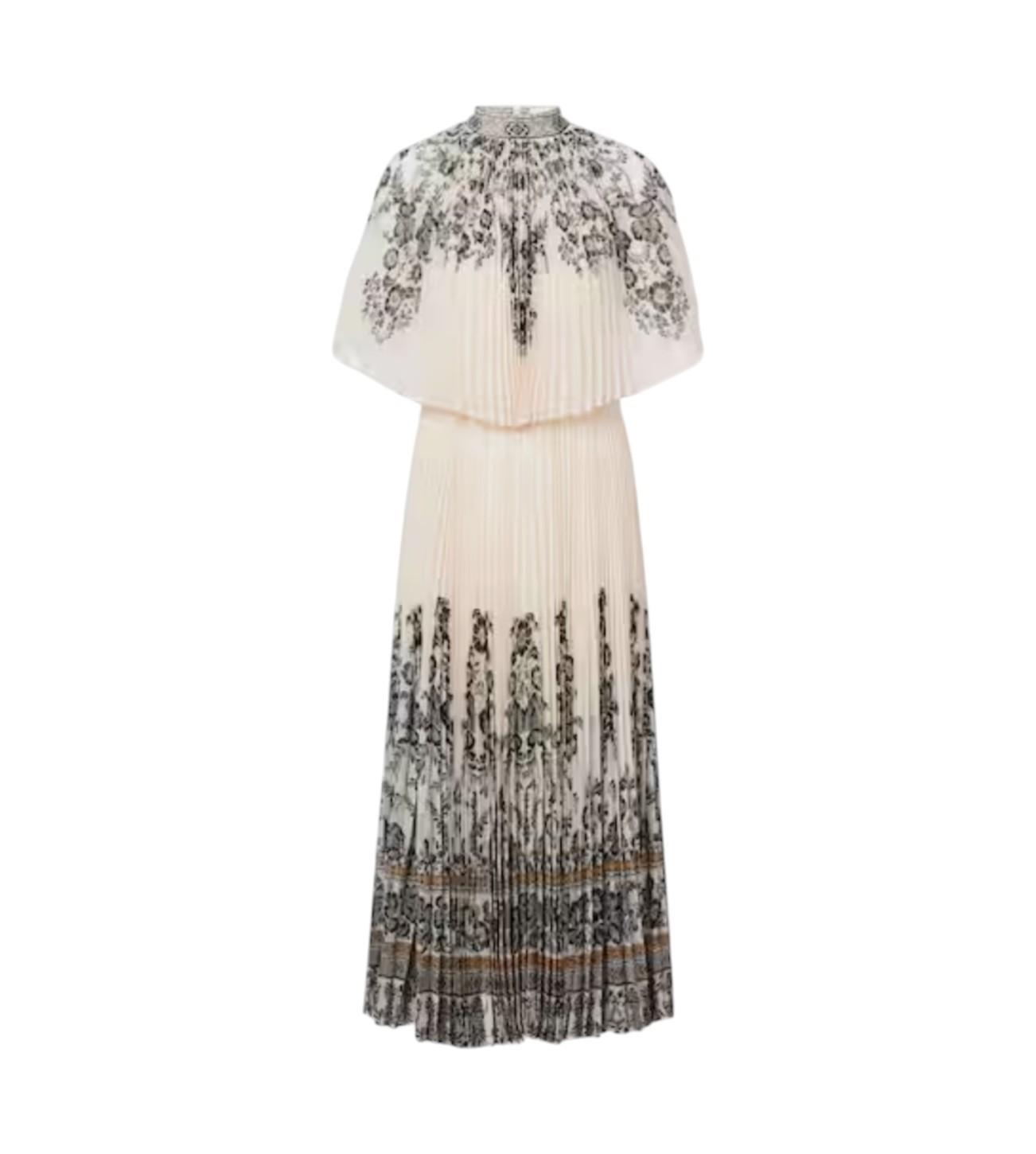 White dress with black floral pattern on a white background