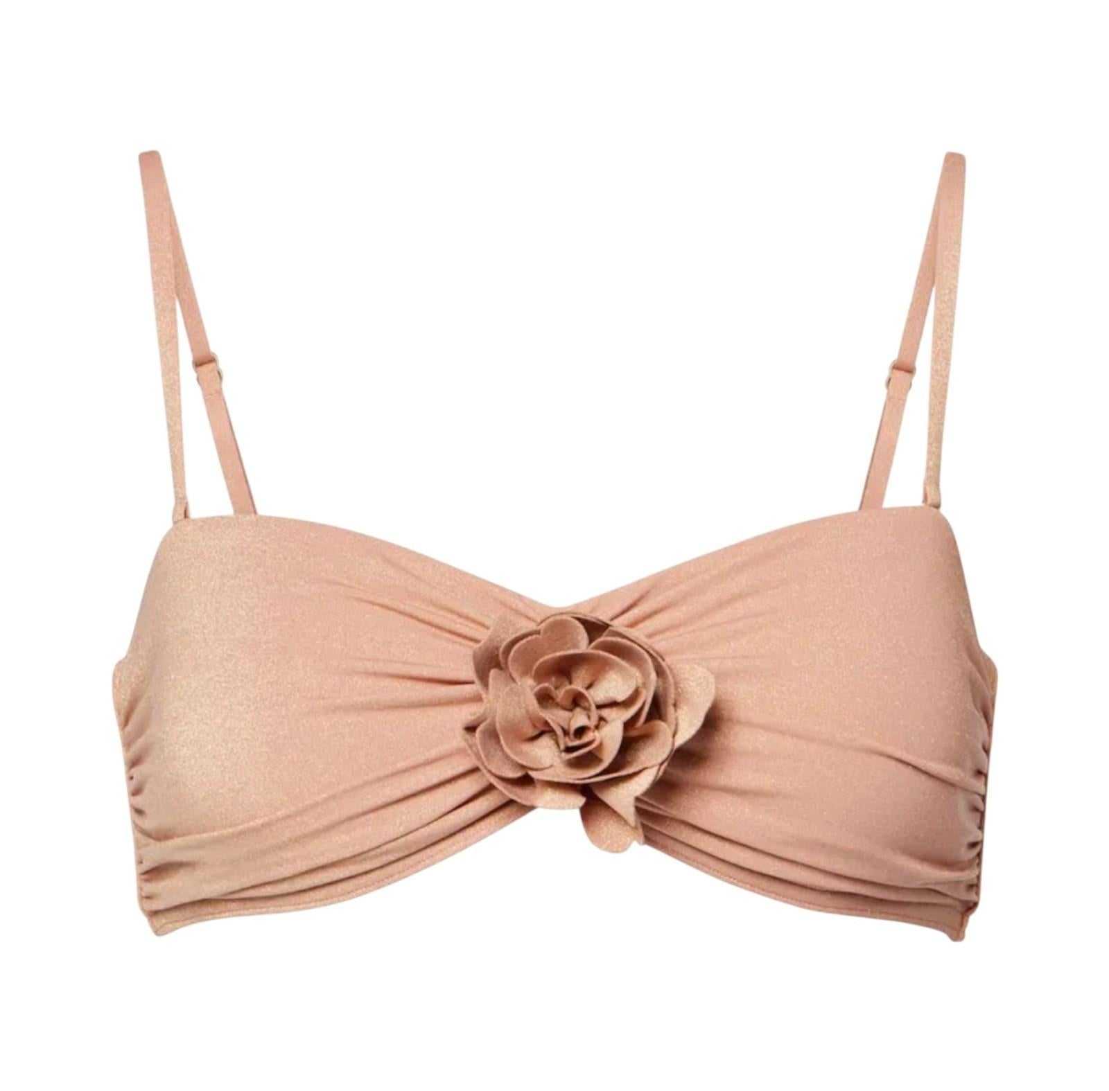 Beige bikini top with floral design on a white background