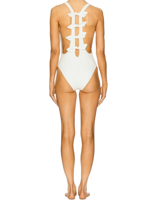 White swimsuit with cut-out design on a white background