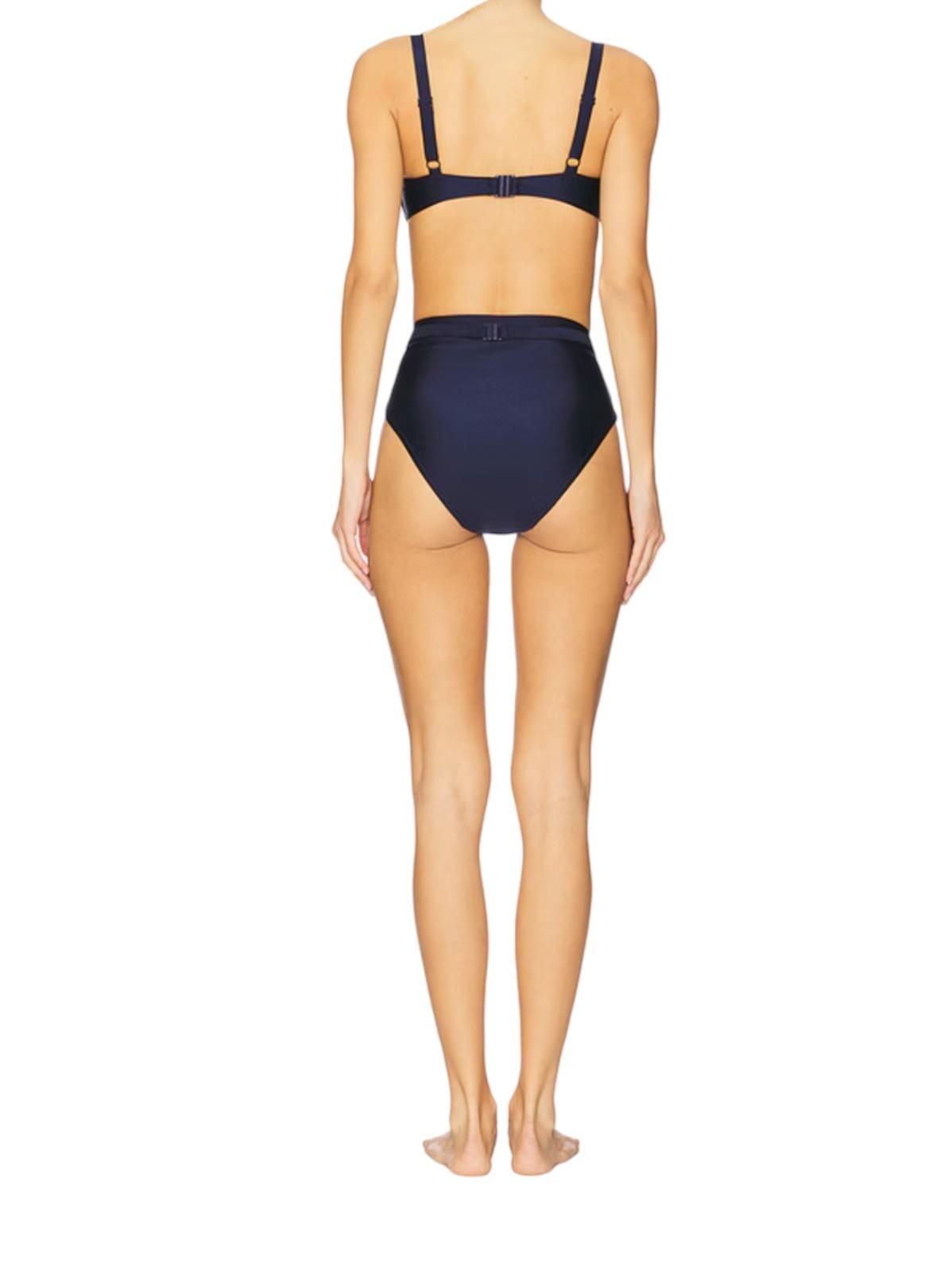 Navy blue bikini set on a white background