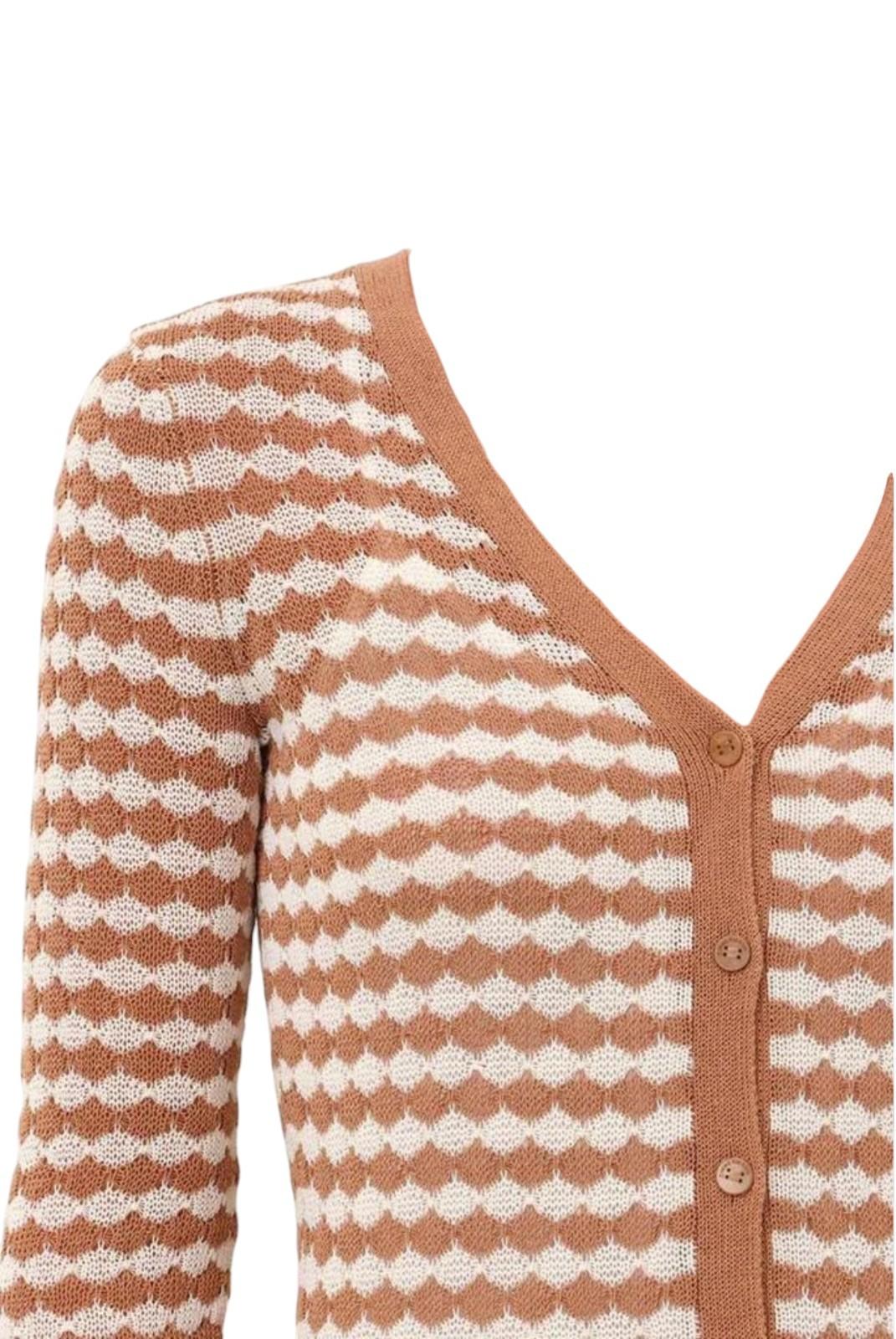 Knitted cardigan with a patterned design on a white background