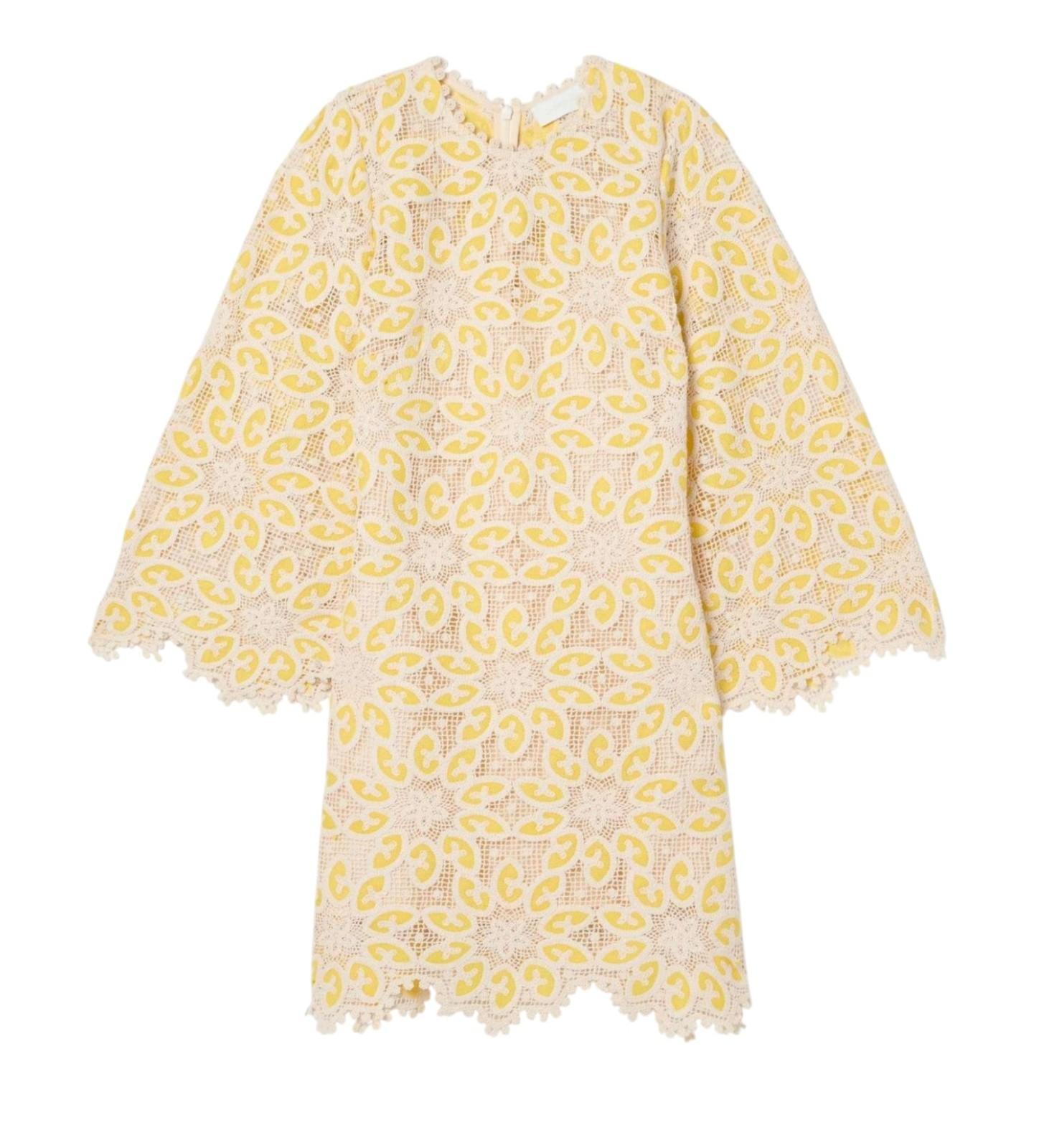 Yellow and beige patterned dress on a white background