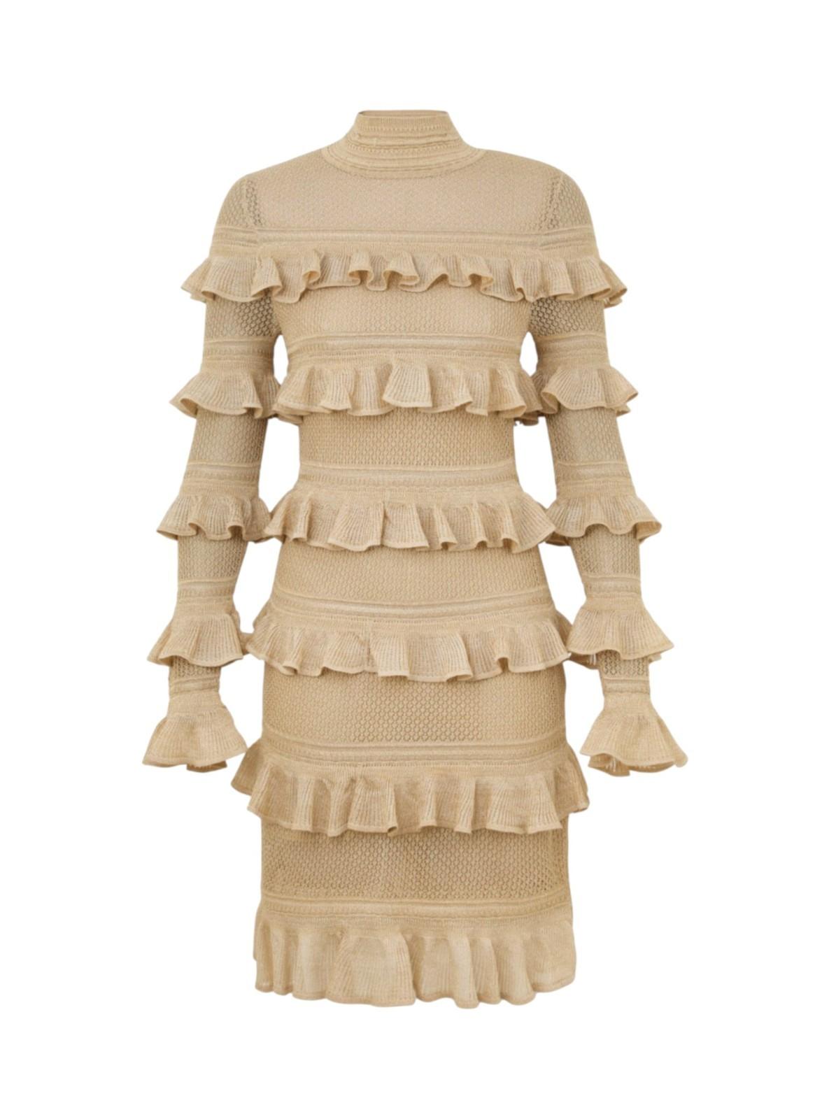Beige dress with ruffled layers on a white background