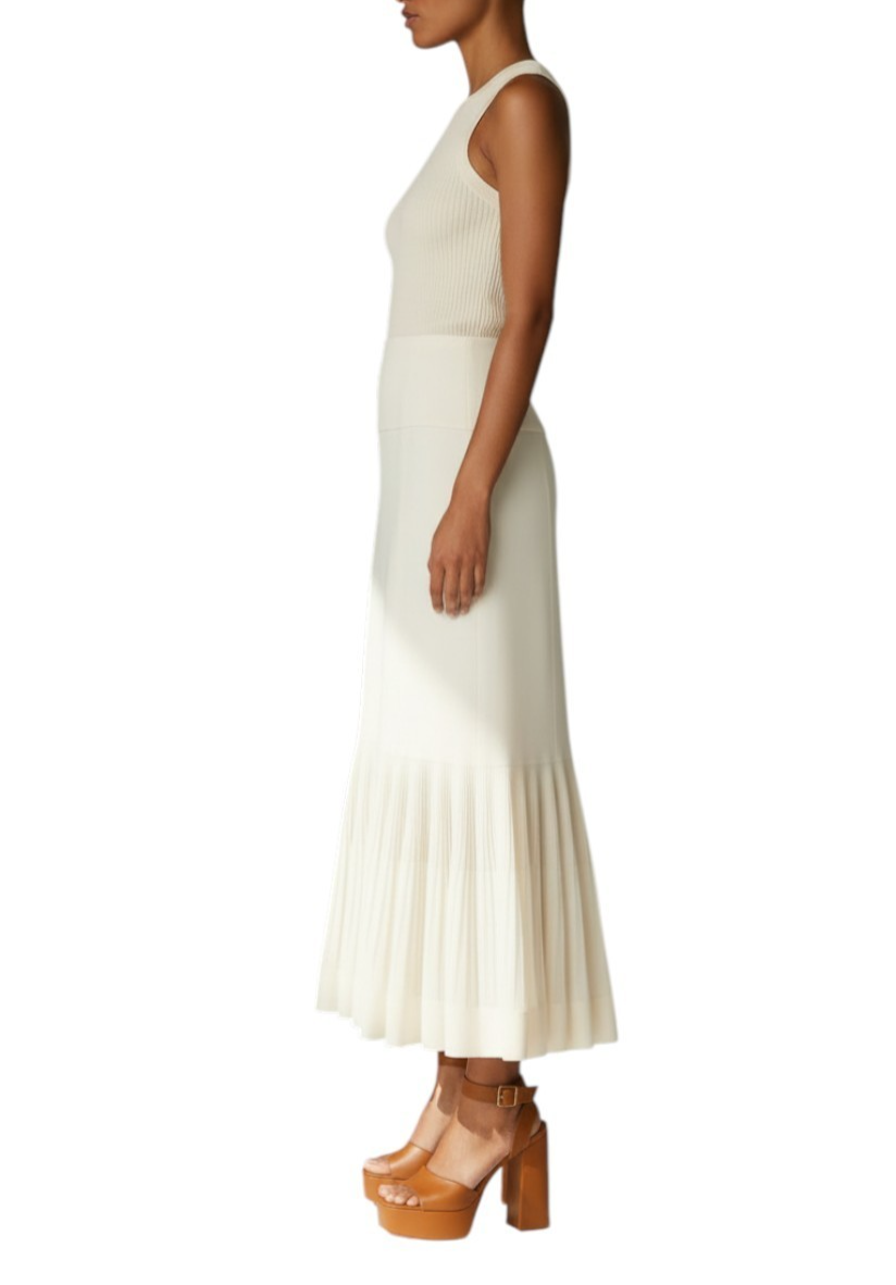 AI generated image of Woman wearing a white dress with pleated skirt on a white background