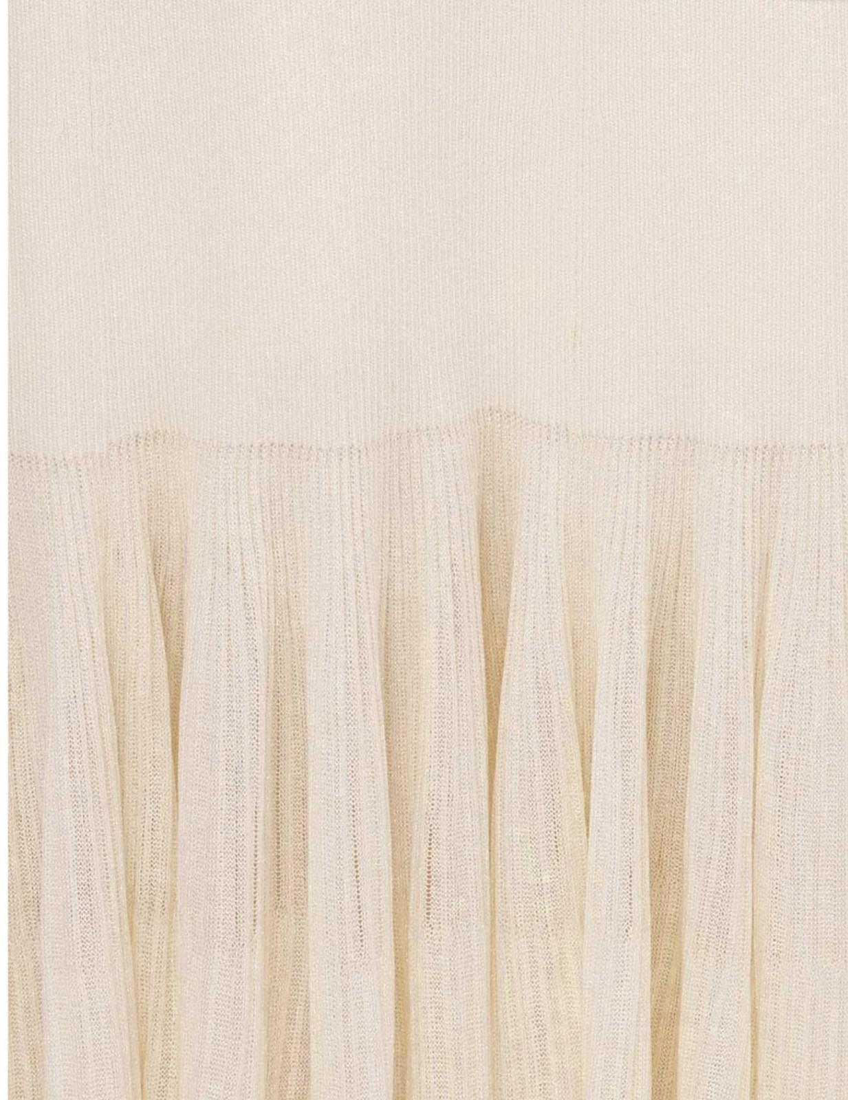Close-up of a textured beige fabric with a subtle pattern