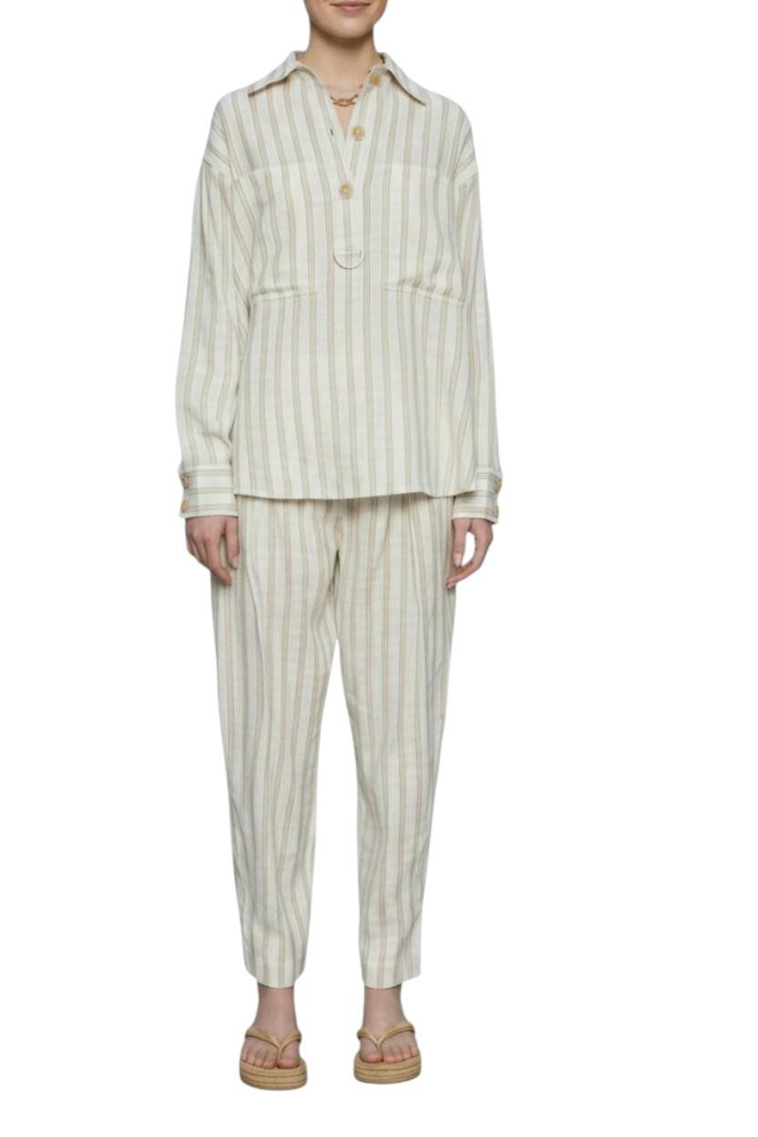 Person wearing a striped outfit on a white background