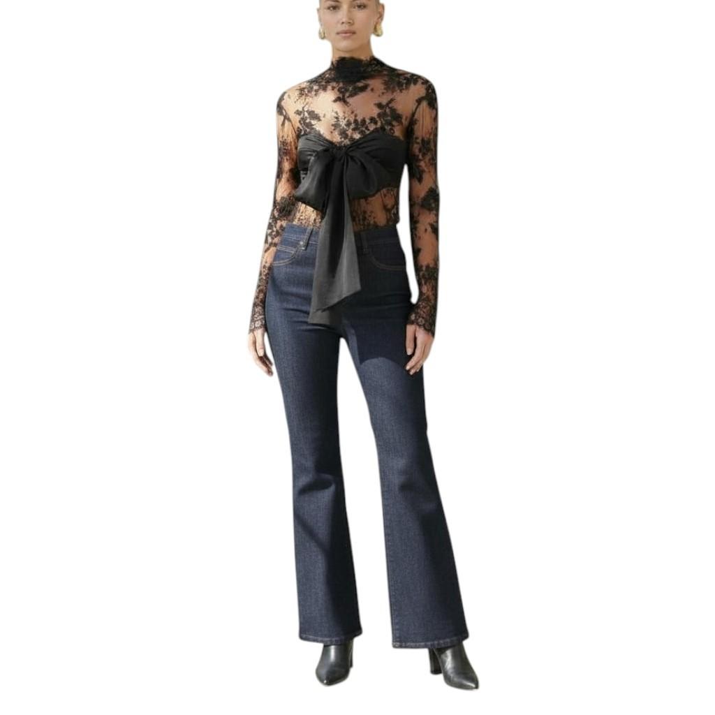 AI generated image of Woman wearing a sheer top with floral patterns and dark jeans on a white background