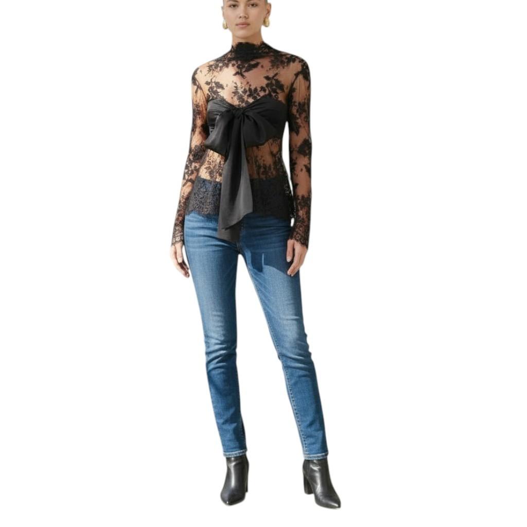 AI generated image of Woman wearing a sheer top with a bow and blue jeans on a white background