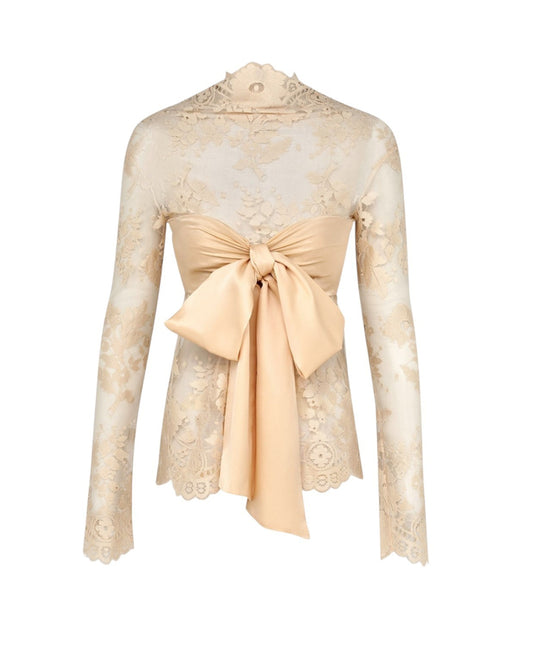 Beige lace top with a bow on a white background