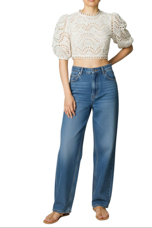 AI-generated image of Person wearing a white lace top and blue jeans on a white background