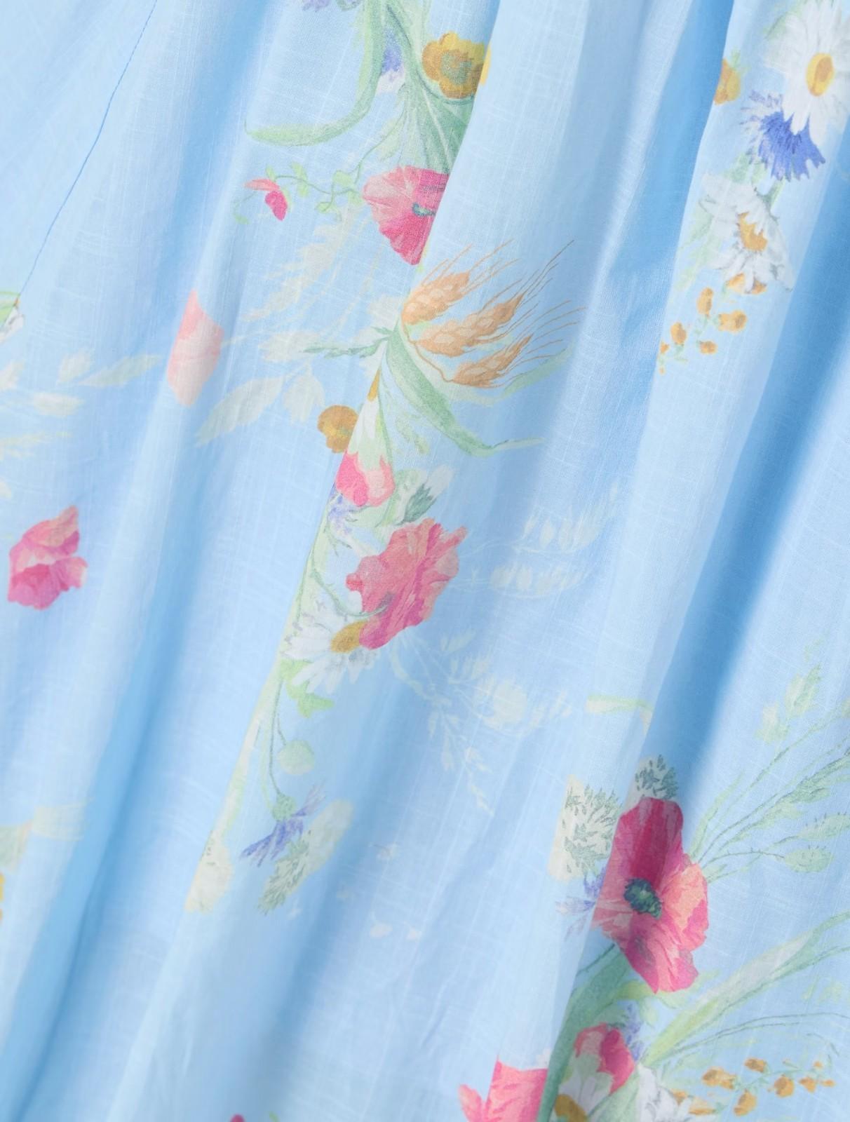 Floral pattern on a light blue fabric background